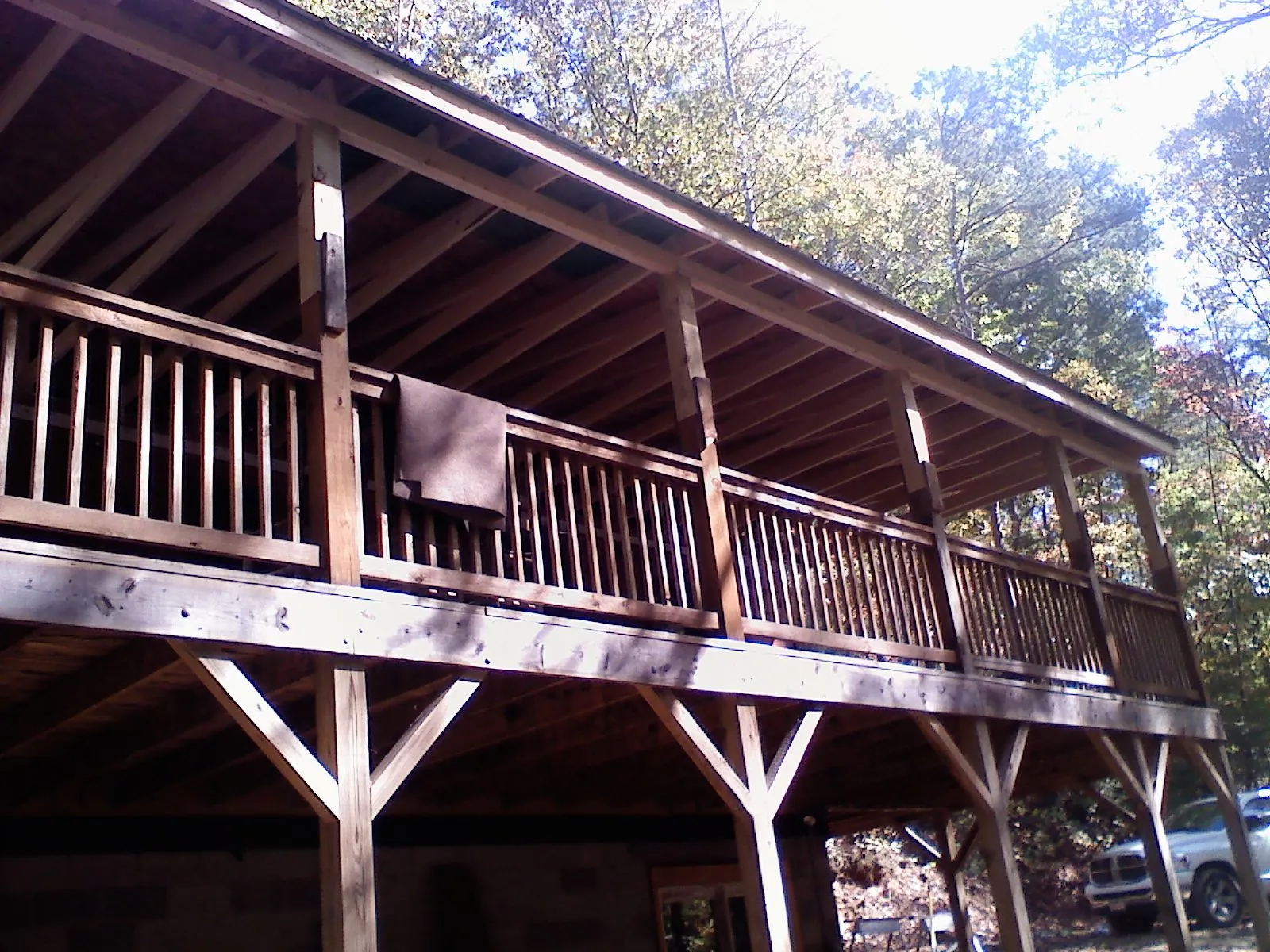 Timber framing under a new elevated porch and deck — Roof Leak Repair in Dry Ridge by Roofing Brothers